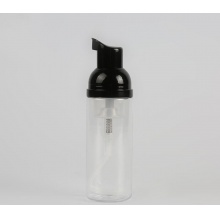 Shiny black plastic lotion pump dispenser with clear PET bottle